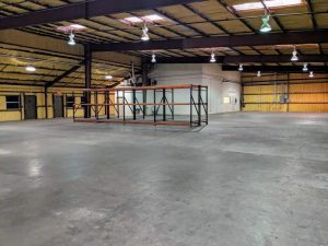 Open warehouse with spray foam insulation and high ceilings
